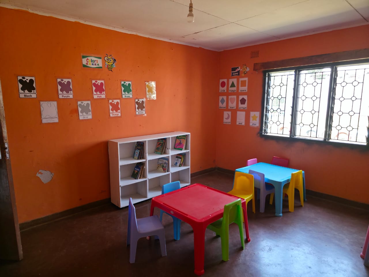 Early years reading corner with book shelves