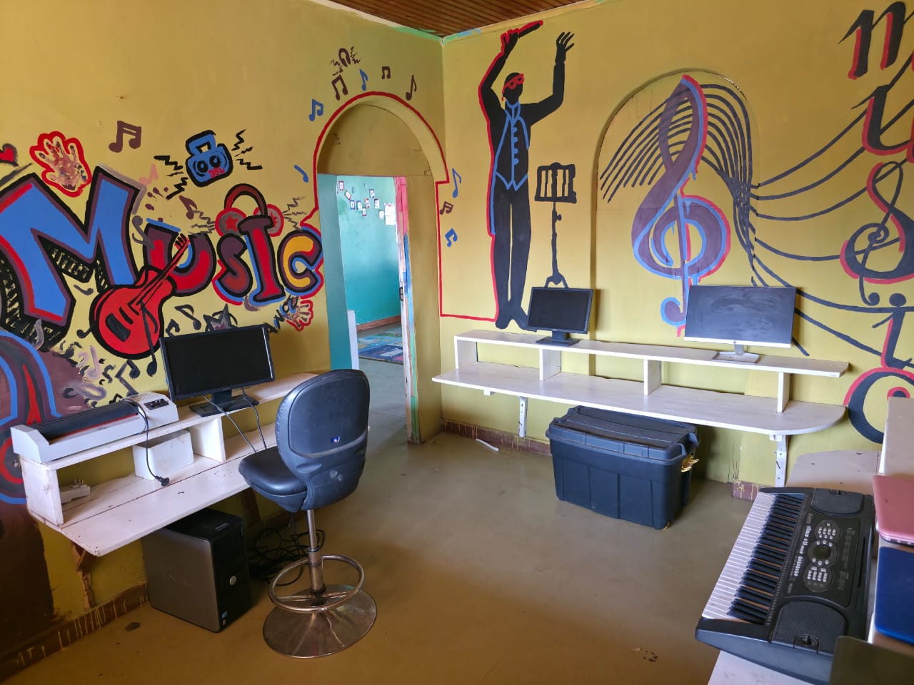 Music room with keyboard and computers